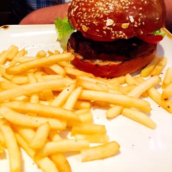 Ghillie Dhu - Grilled short rib and biscuit burger with tomato chutney and cheese on a brioche bun and fries - Pubs Near Me - Edinburgh, EDH Ghillie Dhu - Grilled short rib and biscuit burger with tomato chutney and cheese on a brioche bun and fries - Pubs Near Me - Edinburgh, EDH