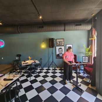 Main & Monroe - a woman standing in a restaurant - Breakfast & Brunch Near Me - Lexington, Tennessee