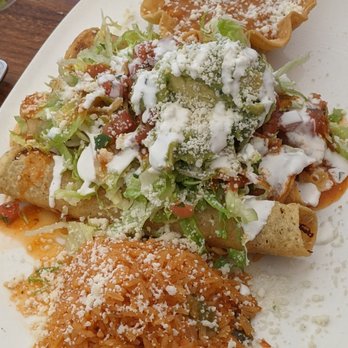 Los Agaves - Chicken and beef flautas with rice and beans. - Tacos Near Me - Santa Barbara, California Los Agaves - Chicken and beef flautas with rice and beans. - Tacos Near Me - Santa Barbara, California