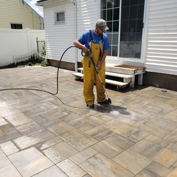 Rock Landscaping & Construction - Power-washing your patio will help increase the life of your pavers. - Landscaping Near Me - East Hampton, Connecticut Rock Landscaping & Construction - Power-washing your patio will help increase the life of your pavers. - Landscaping Near Me - East Hampton, Connecticut
