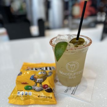 Macguffins - a drink and a snack on a table - Bars Near Me - Irvine, California Macguffins - a drink and a snack on a table - Bars Near Me - Irvine, California