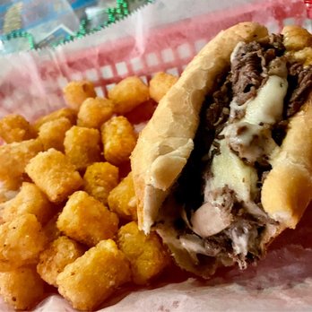 Grinders - 7' Philly Half Ass Tots - Pizza Near Me - Kansas City, Missouri