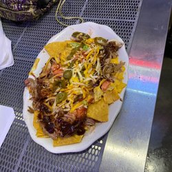 Cattle Stampede Steakhouse - Come have some chicken nachos and every day 4-6 happy hour 3.00 margaritas $1.00 off draft and bottle and wine
