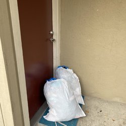SoCo Wash and Fold - Dirty laundry I left outside my front door.