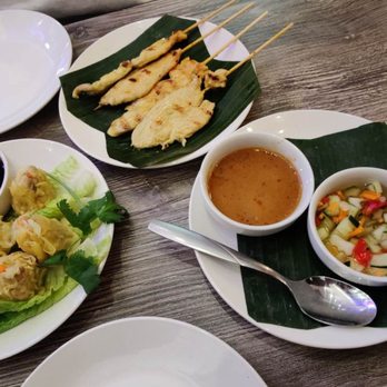 Sukho Thai Restaurant - This is the Chicken Dumplings, Chicken Satay with cucumber salad - Thai Near Me - Runnemede, New Jersey Sukho Thai Restaurant - This is the Chicken Dumplings, Chicken Satay with cucumber salad - Thai Near Me - Runnemede, New Jersey