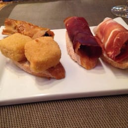 Tapas! Left to right - Brie , black pudding, beef, prosciutto. Tapas! Left to right - Brie , black pudding, beef, prosciutto.