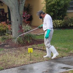 Great Florida Services, Inc. - Treating lawn in Coral Gables House