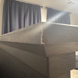 Damage to headboard of baby crib after tech moved it to get to an outlet. Damage to headboard of baby crib after tech moved it to get to an outlet.