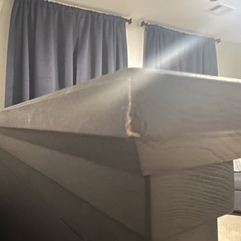 Murphy Family Electric - Damage to headboard of baby crib after tech moved it to get to an outlet. - Electricians Near Me Murphy Family Electric - Damage to headboard of baby crib after tech moved it to get to an outlet. - Electricians Near Me