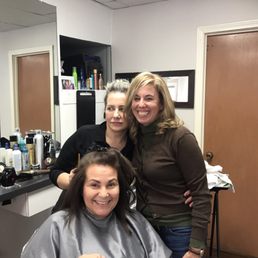 A different salon...just to show the difference. (Back right with brown sweater).  Don't go here if you have curly hair.