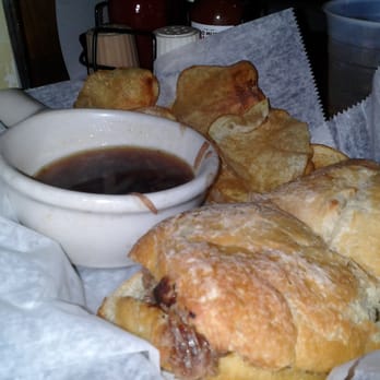 Sidelines Bar & Grill - French Dip sandwich with au jus and housemade potato chips - Dive Bars Near Me - Pittsburgh, Pennsylvania Sidelines Bar & Grill - French Dip sandwich with au jus and housemade potato chips - Dive Bars Near Me - Pittsburgh, Pennsylvania