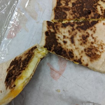 Taco Bell - I love getting the breakfast quesadilla! I always just get egg and cheese, no meat. The bacon is more like bacon bits, not full strips. - Fast Food Near Me - Grand Rapids, Michigan