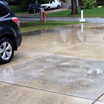 Fortis Paving - This is some of the flooding on driveway. The lighter grey area is how they tried to fix- it peeled two days later! - Masonry/Concrete Near Me - Roselle, Illinois Fortis Paving - This is some of the flooding on driveway. The lighter grey area is how they tried to fix- it peeled two days later! - Masonry/Concrete Near Me - Roselle, Illinois