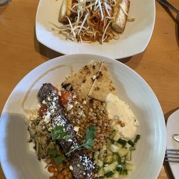 Mythos Restaurant - Souvlaki couscous bowl with beef kebab and tofu pad thai - New American Near Me - Orlando, Florida Mythos Restaurant - Souvlaki couscous bowl with beef kebab and tofu pad thai - New American Near Me - Orlando, Florida