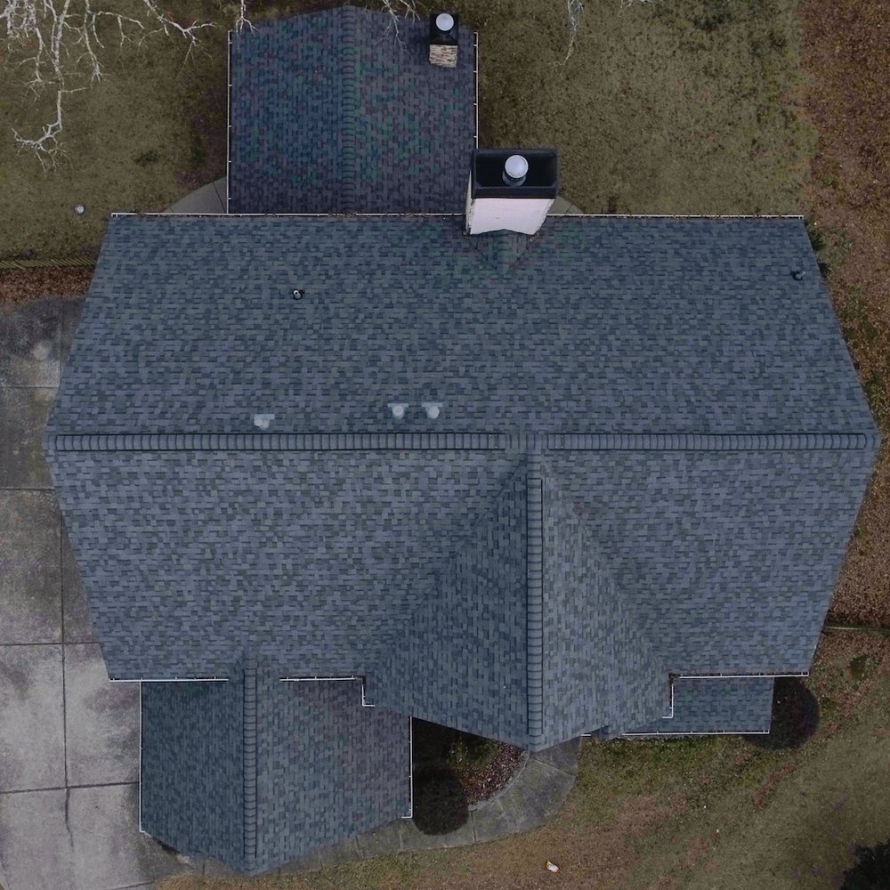 Slide of Check Roofing