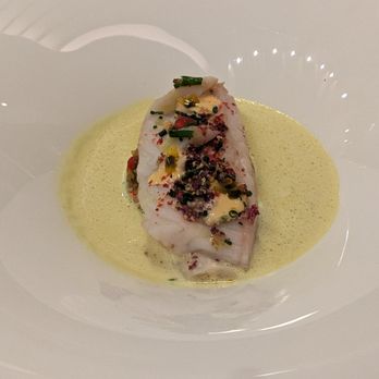 Essential by Christophe - Black Bass - braised with shiitake chutney, razor clams in a turmeric emulsion - sauce is amazing! - French Near Me - New York, New York