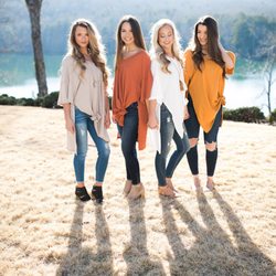 Josie's Boutique - Oversized to perfection, this v-neck tee can be worn so many ways.