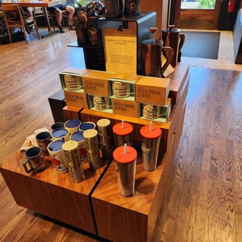 Starbucks - a display of coffee and coffee cups - Coffee & Tea Near Me - Lake Forest, Illinois Starbucks - a display of coffee and coffee cups - Coffee & Tea Near Me - Lake Forest, Illinois