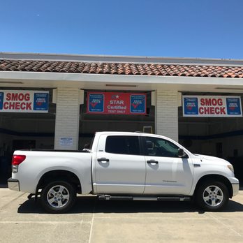 Ron Cromwell Chevron Star Smog - a white truck parked in front of a shop - Smog Check Stations Near Me - Novato, California Ron Cromwell Chevron Star Smog - a white truck parked in front of a shop - Smog Check Stations Near Me - Novato, California