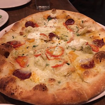 Osteria Marco - Pugiese pizza and arugula salad. Both dishes are delicious and go well together. - Italian Near Me - Denver, Colorado Osteria Marco - Pugiese pizza and arugula salad. Both dishes are delicious and go well together. - Italian Near Me - Denver, Colorado