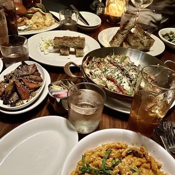 Il Bracco - Table full of food at Il Bracco - Italian Near Me - Houston, Texas Il Bracco - Table full of food at Il Bracco - Italian Near Me - Houston, Texas