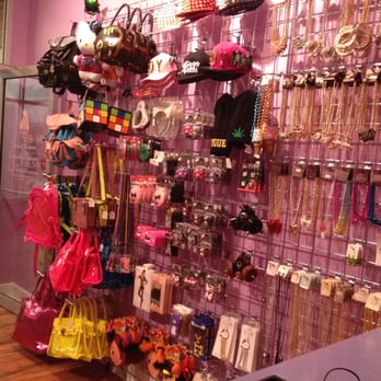 Sweet Poison Cupcake Designs - Accessory wall with bags, hats, jewelry and misc. items. - Accessories Near Me - Rochester, New York Sweet Poison Cupcake Designs - Accessory wall with bags, hats, jewelry and misc. items. - Accessories Near Me - Rochester, New York