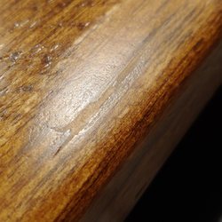 Chic & Antique - Repair of the splinted area again with a big portion of the wood completely sanded away and added wood putty.
