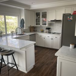 Granite Transformations - Our brand new, beautiful covered counters. You'd never know the black quartz is still underneath.