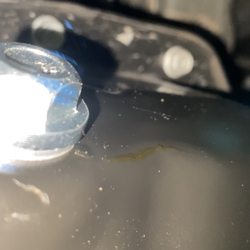 Jiffy Lube - Crack by oil plug