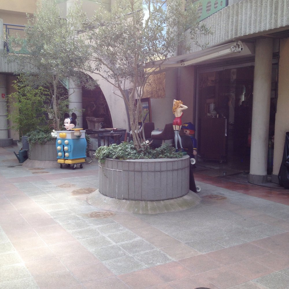A shop with a very cute Mickey Mouse chest of drawers.