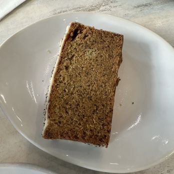 Pura Vida Miami - VEGAN ORANGE POPPY SEED LOAF - Breakfast & Brunch Near Me - Aventura, Florida Pura Vida Miami - VEGAN ORANGE POPPY SEED LOAF - Breakfast & Brunch Near Me - Aventura, Florida