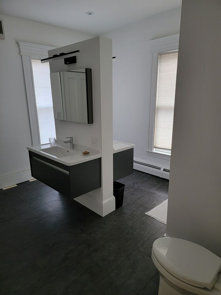 Slide of AT Plumbing Services