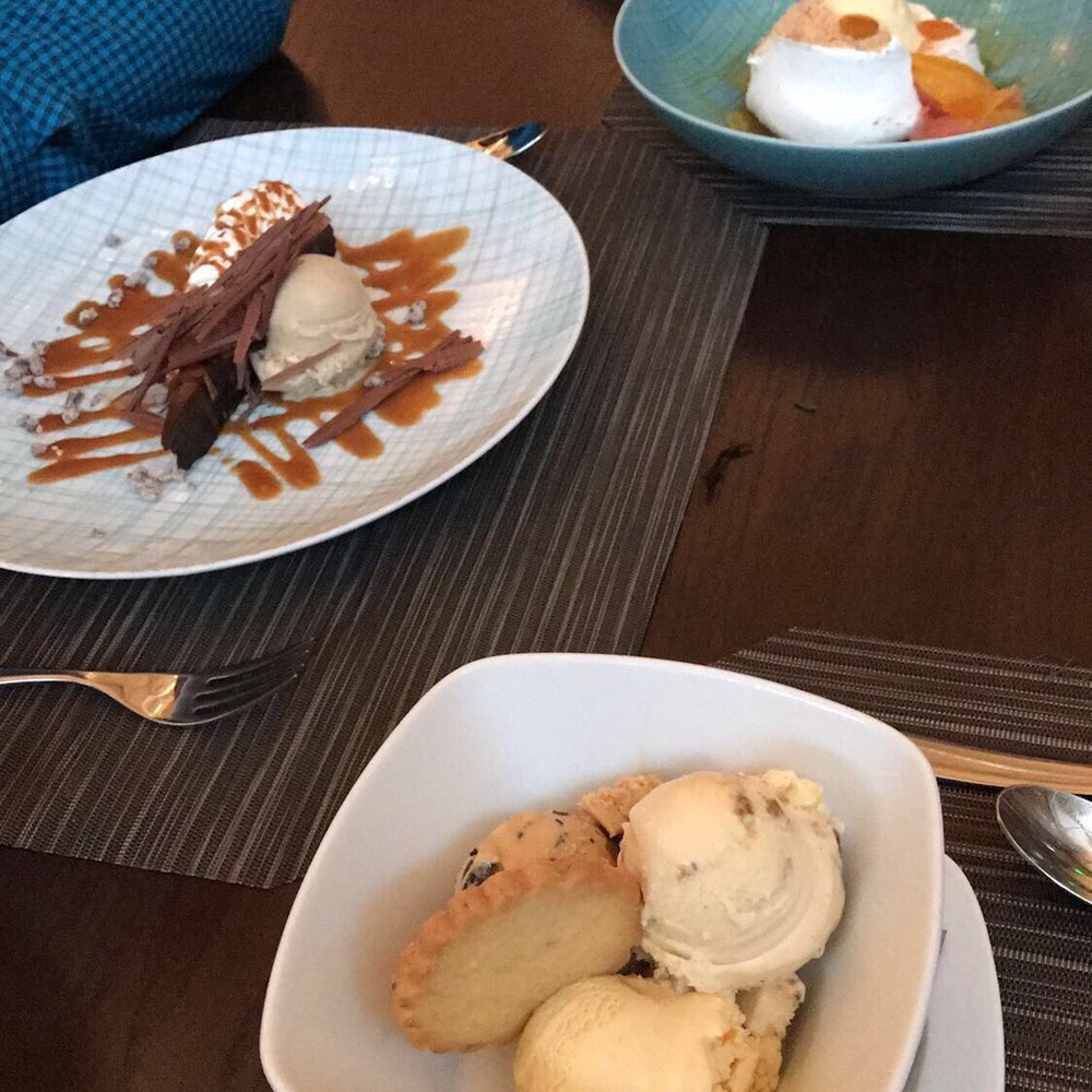 Gunther & Co - Bottom right: ice cream sampler and shortbread cookie; middle: chocolate pave; top right: coconut meringue - Seafood Near Me - Baltimore, Maryland