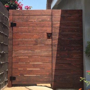 Covington Framing Construction - Clear A redwood gate with hardware, stained - Fences & Gates Near Me - Los Angeles, California Covington Framing Construction - Clear A redwood gate with hardware, stained - Fences & Gates Near Me - Los Angeles, California