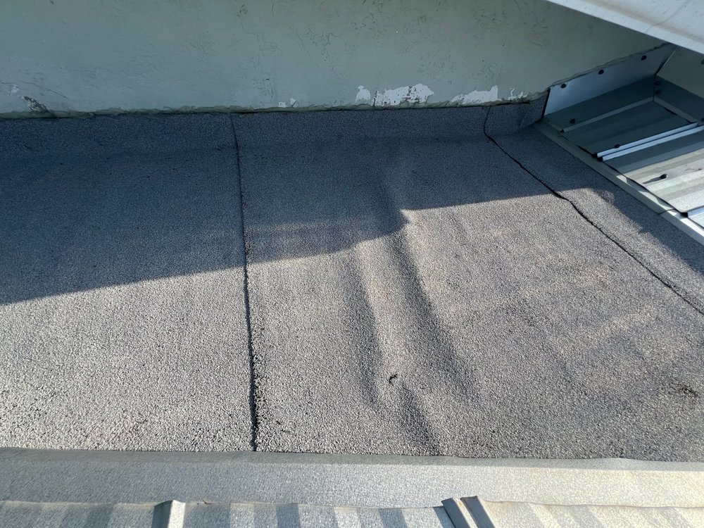 Slide of Modtek Roofing