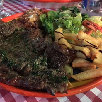 Osteria da Rita - Meat with mix salad and fried potatos - Sicilian Near Me - Taormina, Maine Osteria da Rita - Meat with mix salad and fried potatos - Sicilian Near Me - Taormina, Maine