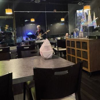 Thai Kitchen - Filming their friend musician play at the front - Thai Near Me - Grand Terrace, California Thai Kitchen - Filming their friend musician play at the front - Thai Near Me - Grand Terrace, California