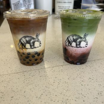 Boba Guys - Pandan Caramel Latte on the left and matcha strawberry on the right - Bubble Tea Near Me - San Francisco, California Boba Guys - Pandan Caramel Latte on the left and matcha strawberry on the right - Bubble Tea Near Me - San Francisco, California