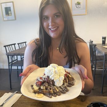 The Drip Coffee House - Granddaughter Olivia great model with a yummy waffle From the Drip Coffee House. - Coffee & Tea Near Me - Edmond, Oklahoma
