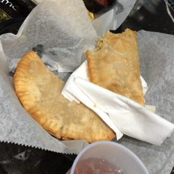 Sidekicks Sports Bar - Chicken empanadas, French fries and a Tito with cranberry and pineapple.