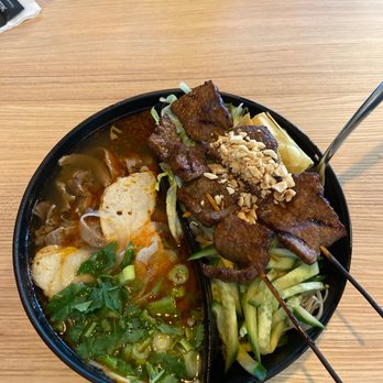 Miss Saigon - Central spicy soup with grilled beef vermicelli double bowl. - Vietnamese Near Me - Edmonton, Alberta