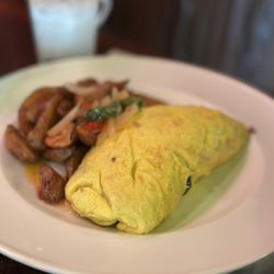 Makahiki - Pork omelet Lots of kalua pork and spinach inside.