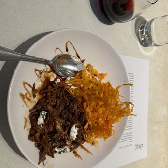 Zhug - Saffron and Date Braised Lamb - Mediterranean Near Me - Cleveland Heights, Ohio Zhug - Saffron and Date Braised Lamb - Mediterranean Near Me - Cleveland Heights, Ohio