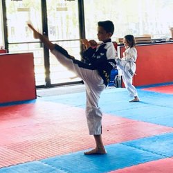 World KM Taekwondo - Ishaan testing for his 2nd Dan Black Belt. We are the only Taekwondo academy that give out Kukkiwon certified black belt.
