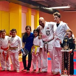 Dakarate Academy - Juniors class with a special needs student