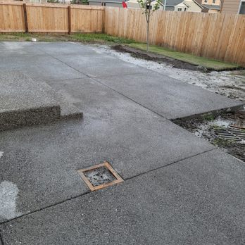 JDT General Contracting and Construction - Large concrete pad will provide multiple options when we finish the yard - General Contractors Near Me JDT General Contracting and Construction - Large concrete pad will provide multiple options when we finish the yard - General Contractors Near Me