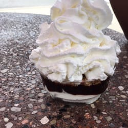Tone's Cones - Small hot fudge sundae with chopped peanuts and whip cream $2.80-something. Tasty.