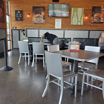 BurgerFi - Wiping down in between customers - American Near Me - Lawrenceville, Georgia