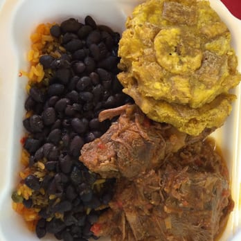 Old Cuban Cafe - Yellow rice with stewed beef chunks and fried green plantains! - Cafes Near Me - Orlando, Florida Old Cuban Cafe - Yellow rice with stewed beef chunks and fried green plantains! - Cafes Near Me - Orlando, Florida