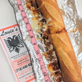 Louie's Pizza - a hot dog in foil - Italian Near Me - Elmhurst, New York Louie's Pizza - a hot dog in foil - Italian Near Me - Elmhurst, New York
